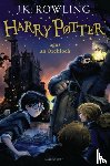 Rowling, J. K. - Harry Potter and the Philosopher's Stone (Irish)