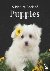 A Picture Book of Puppies -...